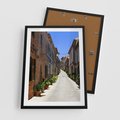 Plakat w ramie 50x70 - Urok uliczki: perspektywa miasta - uliczka, perspektywa - rama czarna