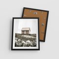 Plakat w ramie 40x50 - Krajobraz z Przeszłości: Kwitnąca Łąka w Sepii - domek na wzgórzu, kwitnąca łąka - rama czarna