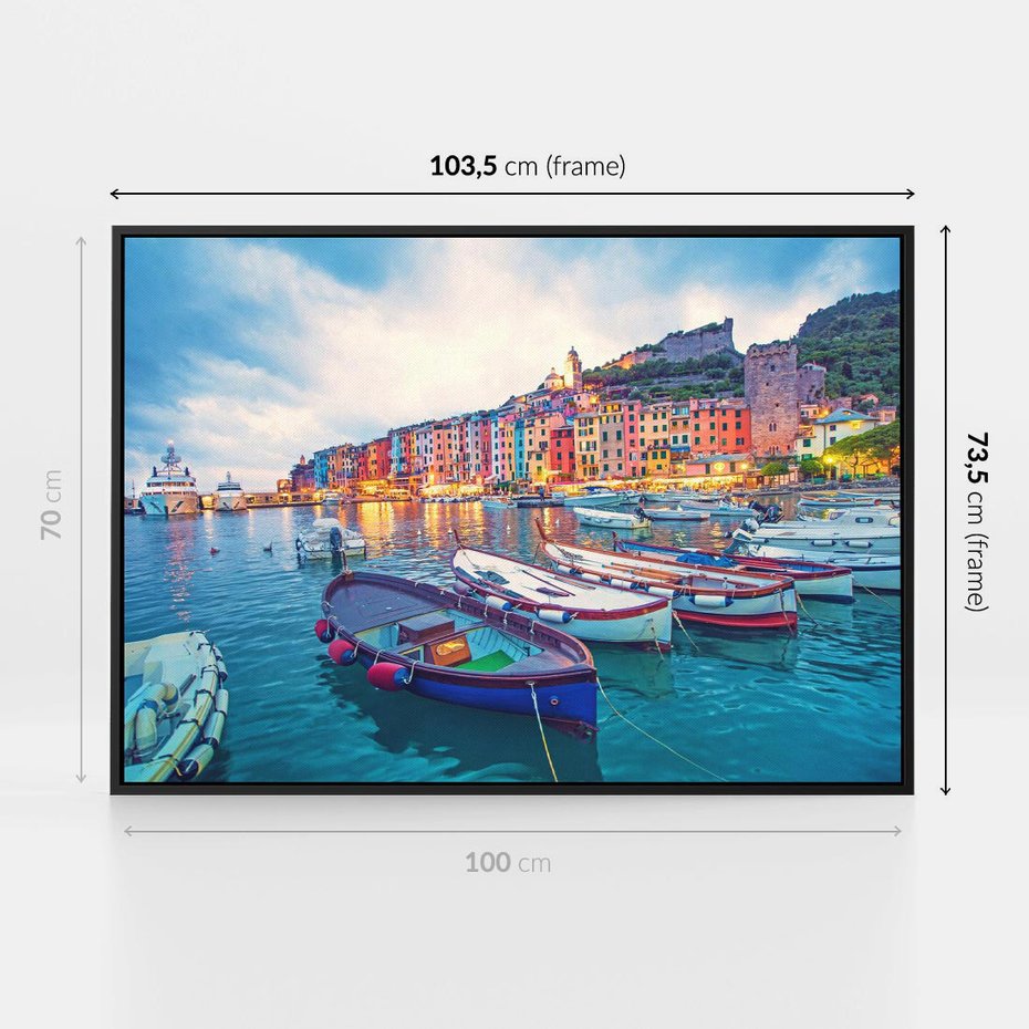 Obraz w ramie 100x70 - Tańczące kolory zachodu - nadmorskie kolorowe miast, kolorowe budynki na brzegu - rama czarna