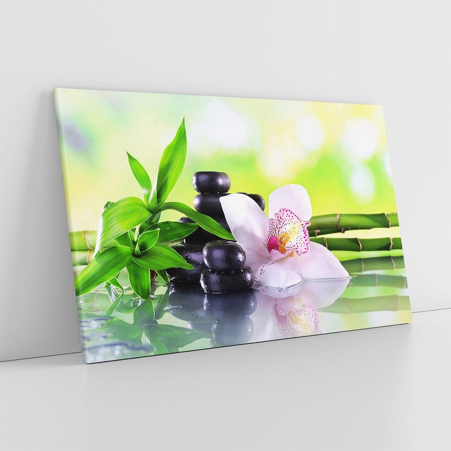 Obraz na płótnie 100x70 - Oaza Spokoju: Bambus, Kwiaty i Kamienie w SPA - bambus, kwiat