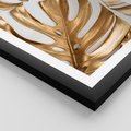 Plakat w ramie 50x70 - Złote Akcenty w Fotografii - złotel liście monstery, na białym tle - rama czarna