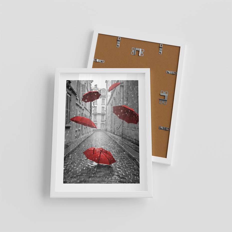 Plakat w ramie 30x40 - Parasole w malowniczej uliczce - parasole, uliczka - rama biała