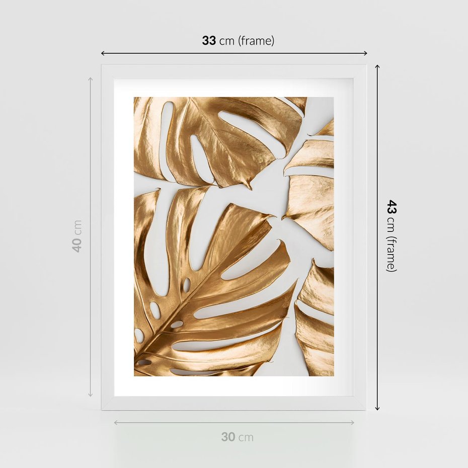 Plakat w ramie 30x40 - Złote Akcenty w Fotografii - złotel liście monstery, na białym tle - rama biała