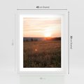 Plakat w ramie 40x50 - Łąka we Wschodzącym Słońcu: Magia Poranka - łąka, krajobraz - rama biała
