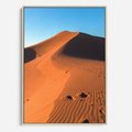Obraz w ramie 70x100 - Piasek pustyni wędruje - pustynia, piasek - rama drewno