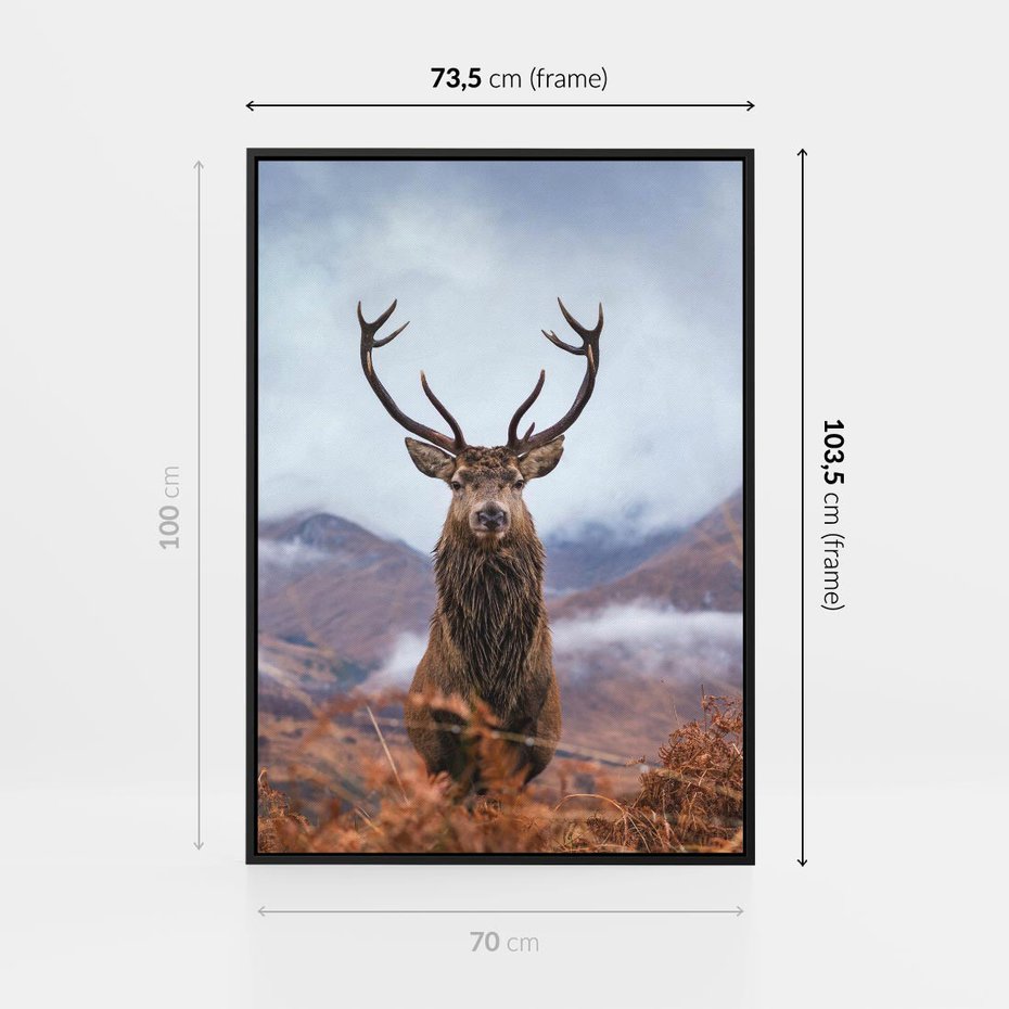 Obraz w ramie 70x100 - Jeleń w Uśpionym Krajobrazie - jeleń na tle gór, ośnieżone góry - rama czarna