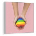 Obraz w ramie 50x50 - Miłość na Dłoniach - zdjęcie, dłonie trzymają ulepione tęczowe serce - rama biała