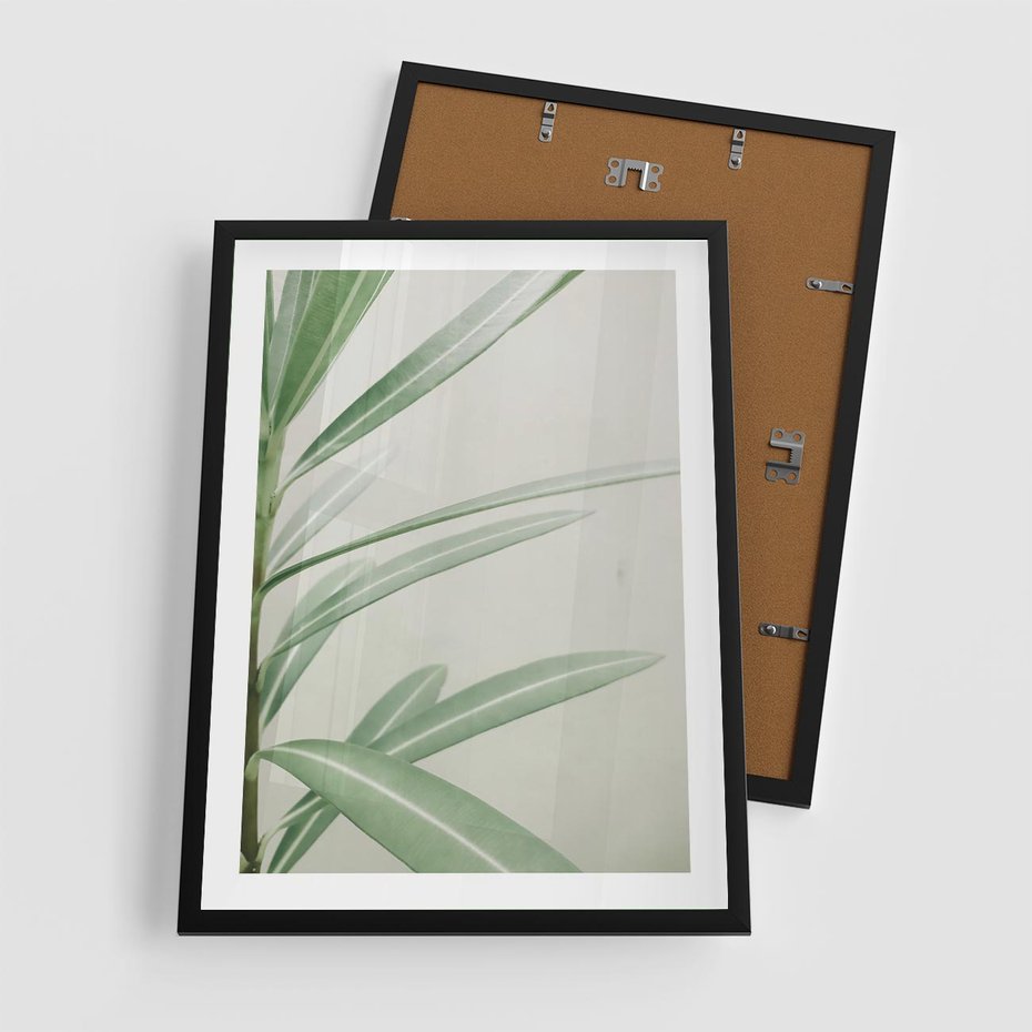 Plakat w ramie 50x70 - Minimalistyczna Tropikalna Harmonia - tropikalna roślina, zielone liście - rama czarna