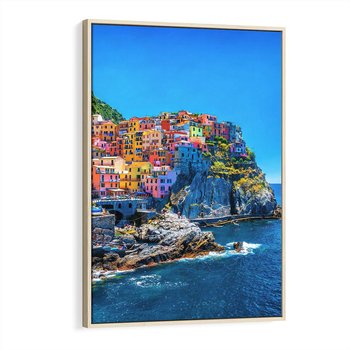 Obraz w ramie 70x100 - Barwne Wybrzeże - nadmorskie miasto na klifie, kolorowe tęczowe budynki - rama drewno