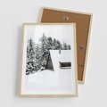 Plakat w ramie 50x70 - Zimowy Urok - śnieg, domek w górach - rama drewno