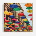Obraz w ramie 80x80 - Barwna symfonia wyobraźni - fotografia, kolorowe parasolki podwieszone nad ulicą - rama drewno