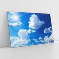 Obraz na płótnie 70x50 - Niebiańska panorama: Słońce, niebo i chmury - niebo, słońce