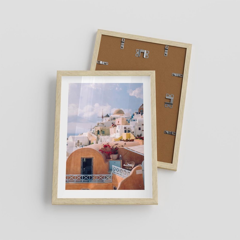 Plakat w ramie 30x40 - Błękit Morza i Białe Domki - Santorini, wyspa - rama drewno