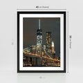Plakat w ramie 40x50 - Miasto rozświetlone nocnym blaskiem - miasto, nocą - rama czarna