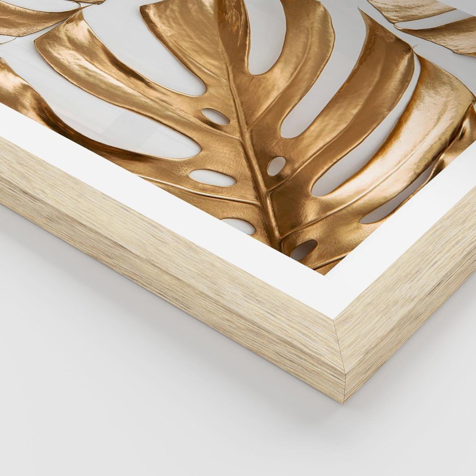 Plakat w ramie 40x50 - Złote Akcenty w Fotografii - złotel liście monstery, na białym tle - rama drewno