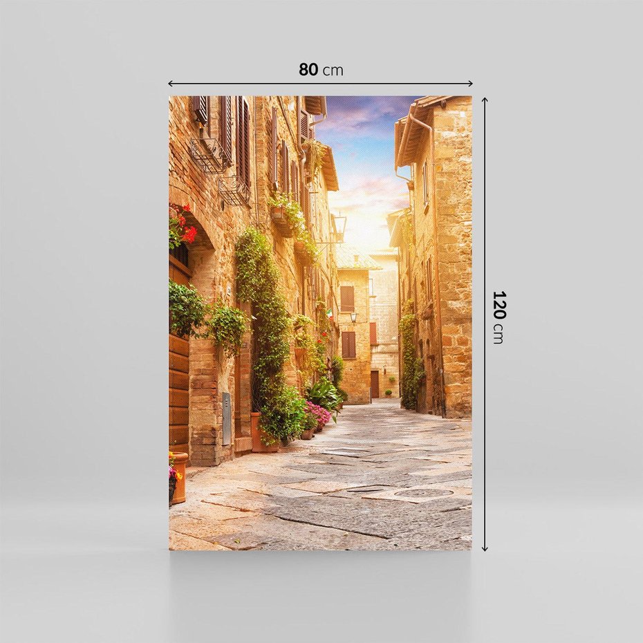 Obraz na płótnie 80x120 - Urok uliczki miejskiej z kwiatami - sklep, uliczka