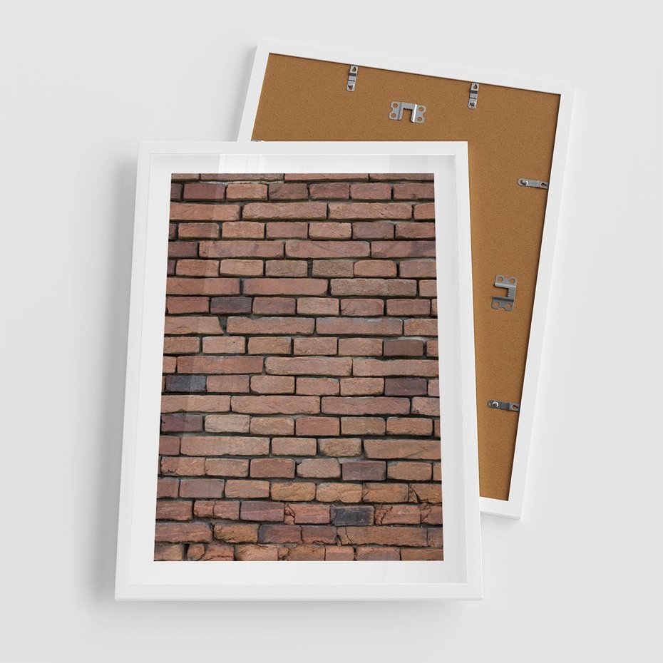 Plakat w ramie 50x70 - Mur cegieł: industrialny urok - cegły, mur - rama biała