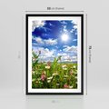 Plakat w ramie 50x70 - Niebiańska łąka pełna kwiatów - łąka, niebo - rama czarna