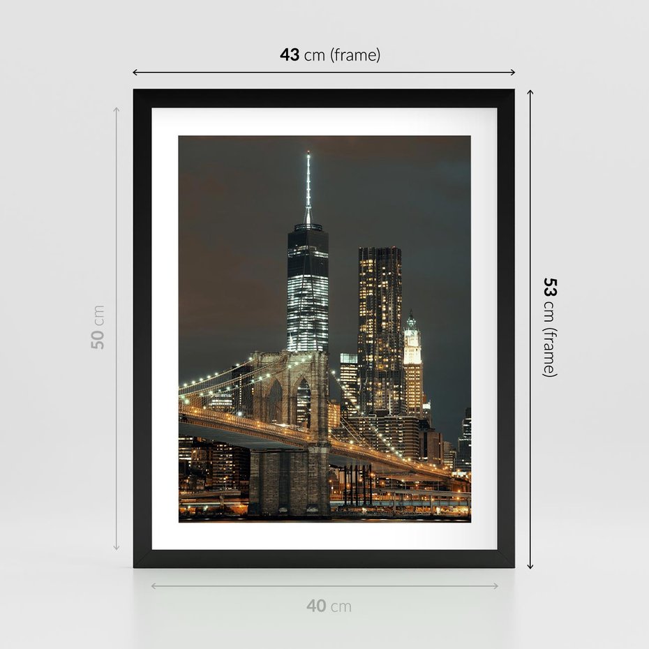 Plakat w ramie 40x50 - Miasto rozświetlone nocnym blaskiem - miasto, nocą - rama czarna