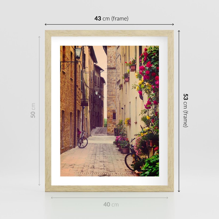 Plakat w ramie 40x50 - Rowerowa przygoda w uliczkach pełnych perspektywy - uliczka, perspektywa - rama drewno