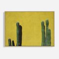 Obraz w ramie 120x80 - Refleksje w roślinnym odbiciu - zielone kaktusy na tle żółtej ściany, soczyste kolory - rama drewno