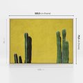 Obraz w ramie 100x70 - Refleksje w roślinnym odbiciu - zielone kaktusy na tle żółtej ściany, soczyste kolory - rama drewno