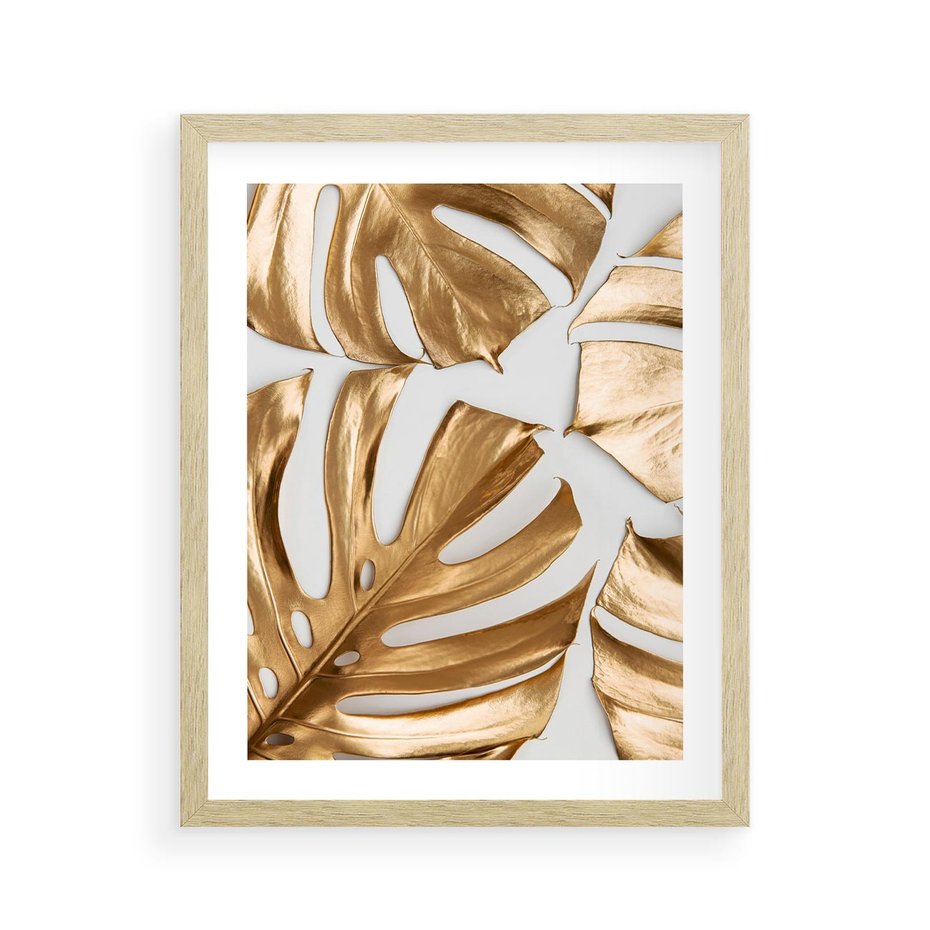 Plakat w ramie 40x50 - Złote Akcenty w Fotografii - złotel liście monstery, na białym tle - rama drewno
