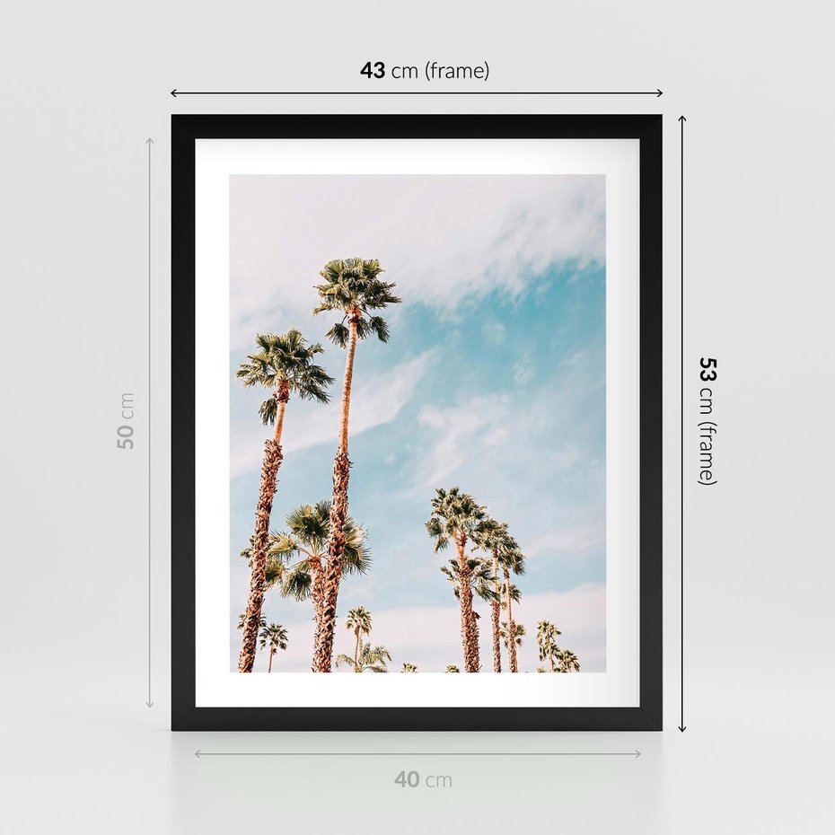 Plakat w ramie 40x50 - Tropikalna Sielskość: Palmy i Błękitne Niebo - palmy na tle błękitnego nieba - rama czarna