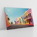 Obraz na płótnie 100x70 - Ekspresja marzeń i tęsknot - pastelowe kolorowe budynki, wzdłuż ulicy