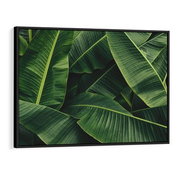 Obraz w ramie 100x70 - Zaklęta roślinna ekspresja - liście bananowca, gęsto ułożone - rama czarna