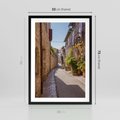 Plakat w ramie 50x70 - Uliczka Wakacyjnego Miasteczka - uliczka, wakacje - rama czarna