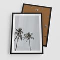 Plakat w ramie 50x70 - Tropikalny Raj: Palmy i Niebo - palmy, niebo - rama czarna