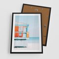 Plakat w ramie 50x70 - Letnia Idylla - plaża, domek na plaży - rama czarna