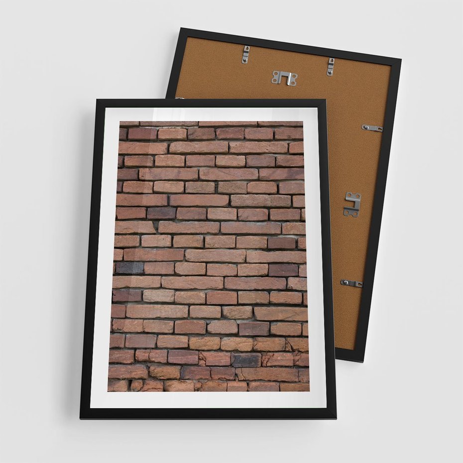 Plakat w ramie 50x70 - Mur cegieł: industrialny urok - cegły, mur - rama czarna