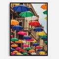 Obraz w ramie 50x70 - Barwna symfonia wyobraźni - fotografia, kolorowe parasolki podwieszone nad ulicą - rama czarna