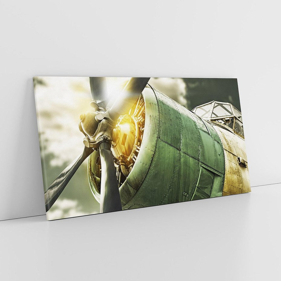 Obraz na płótnie 140x70 - Symbole wojskowych czasów - samolot, śmigło