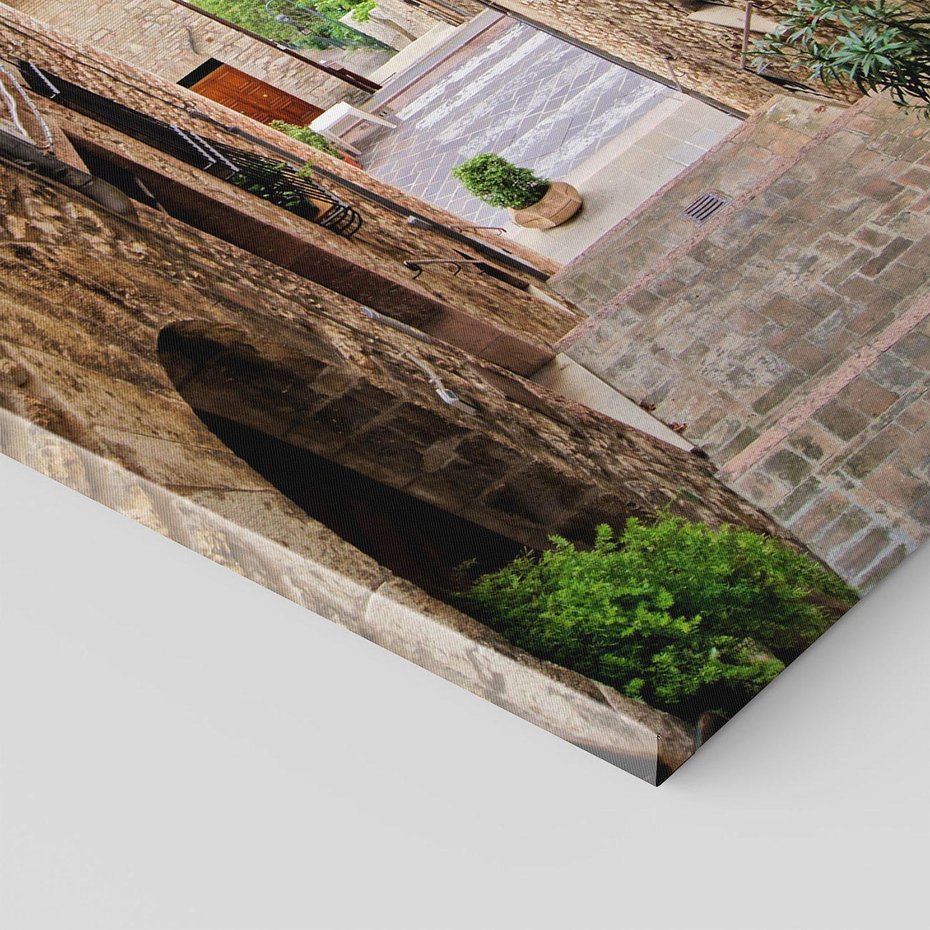 Obraz na płótnie 80x120 - Perspektywa malowniczej uliczki - uliczka, perspektywa