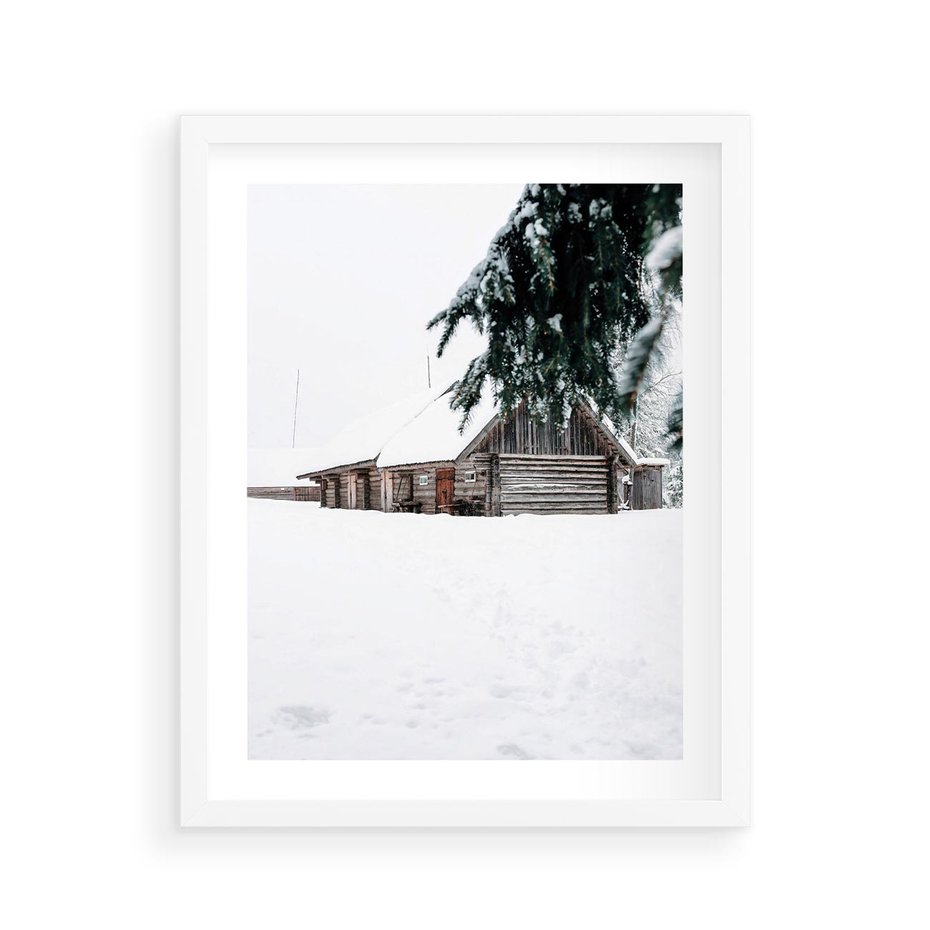 Plakat w ramie 40x50 - Zimowy Azyl - domek w górach, śnieg - rama biała