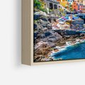 Obraz w ramie 100x70 - Barwne Wybrzeże - nadmorskie miasto na klifie, kolorowe tęczowe budynki - rama drewno
