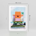 Plakat w ramie 50x70 - Plaża Miami w Słoneczny Dzień - domek ratownika, kolorowy - rama biała