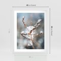 Plakat w ramie 40x50 - Zimowy Urok Natury - gałązki pod śniegiem, natura - rama biała