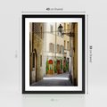 Plakat w ramie 40x50 - Uliczka: perspektywa miejskiego krajobrazu - uliczka, perspektywa - rama czarna