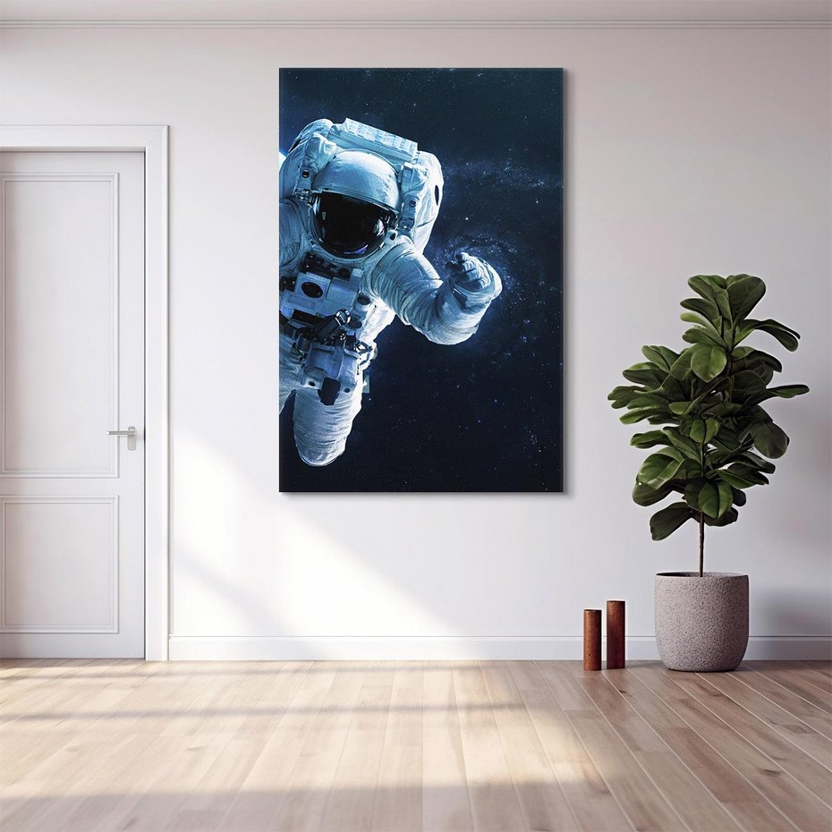 Obraz na płótnie 50x70 - kosmiczna podróż - kosmonauta, ziemia