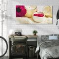 Obraz na płótnie 120x60 - Relaksujący moment: świeczki i kwiaty w SPA - świeczki, kwiat