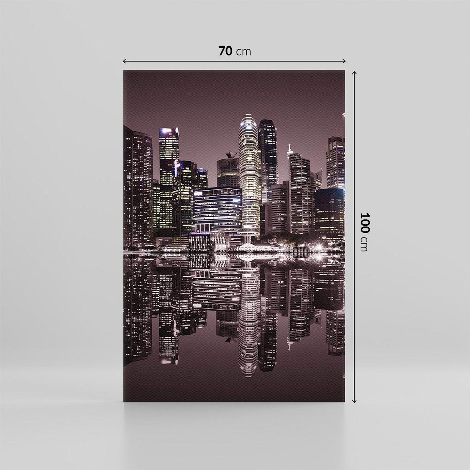 Obraz na płótnie 70x100 - Miejskie światła ożywiające nocne niebos - Singapur, miasto