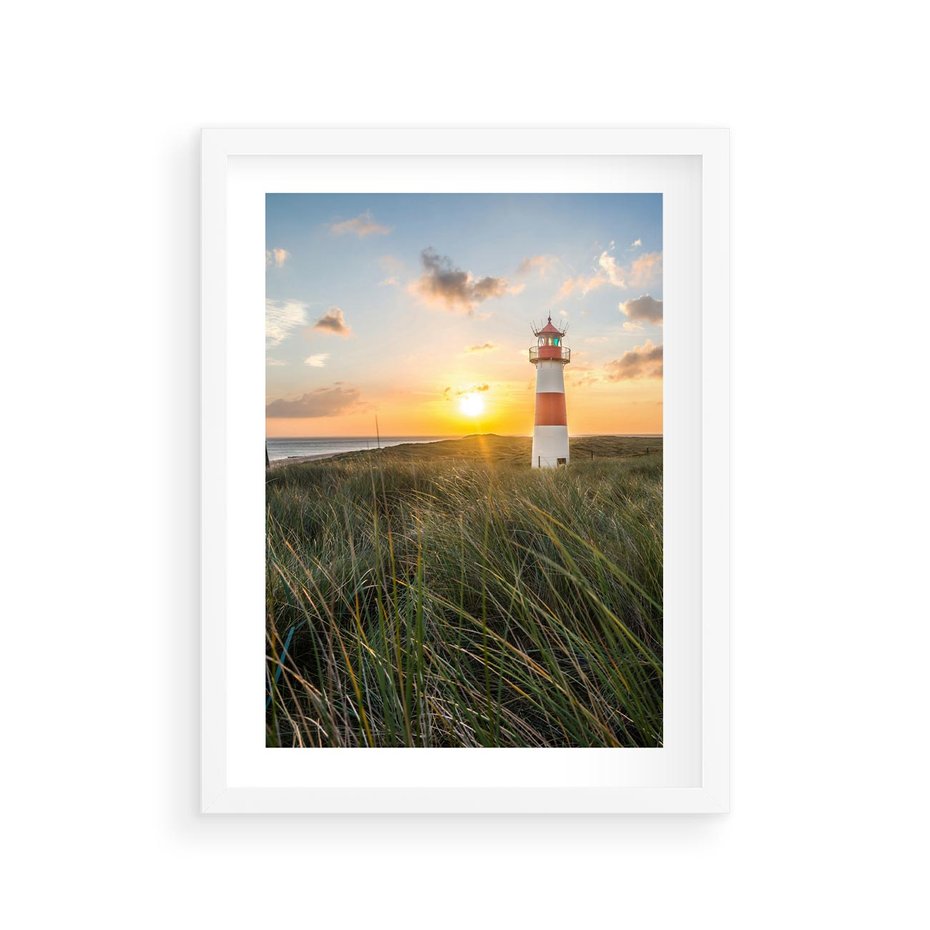 Plakat w ramie 30x40 - Magia latarni przy zachodzie - latarnia, zachód - rama biała