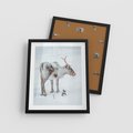 Plakat w ramie 40x50 - Magia Świąt - renifer na śniegu, śnieg - rama czarna