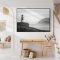 Obraz w ramie 70x50 - Melancholia Północy - czarnobiała fotografia, nadmorska latarnia na klifie - rama czarna