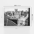 Obraz w ramie 120x80 - Miasto w Retro Odsłonie - fotografia czarno biała, ujęcie na dachy wielkiego miasta - rama biała