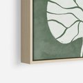 Obraz w ramie 70x100 - Migotliwe Wnętrze Zieleni - zielony plakat, roślinne motywy - rama drewno